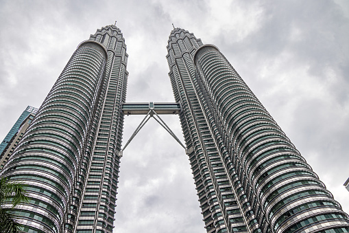 Petronas Towers, Kuala Lumpur, Malaysia - January 8th 2024:  The Petronas Powers where built in 1998 and where for 6 years the highest man made object in the world. They where designed by the Bangladeshi architect Fazlur Rahman Kahn.