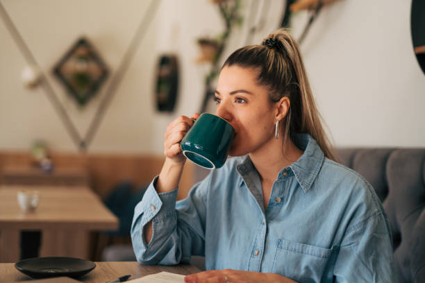 istock Young female drinkig coffee 2078568833