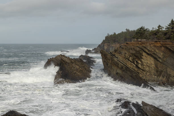 istock The ocean is rough and the rocks are jagged 2078574918