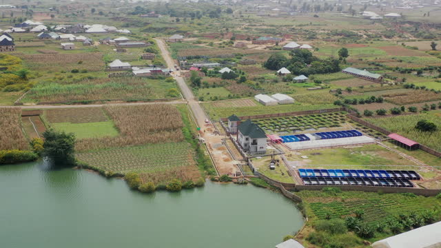 Ponds feeding into fishery tanks in Jos Town, Nigeria - aerial