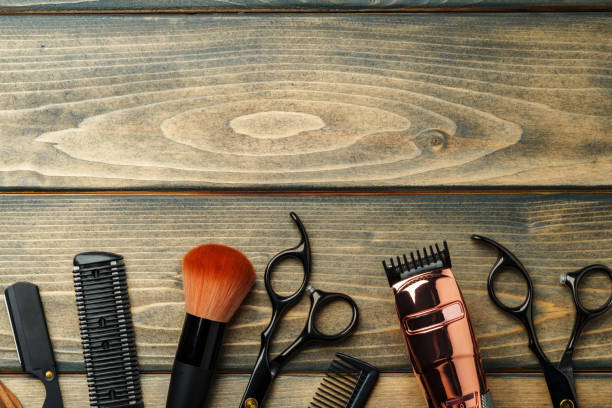 istock Set of professional barber tools on wooden table 2078607801