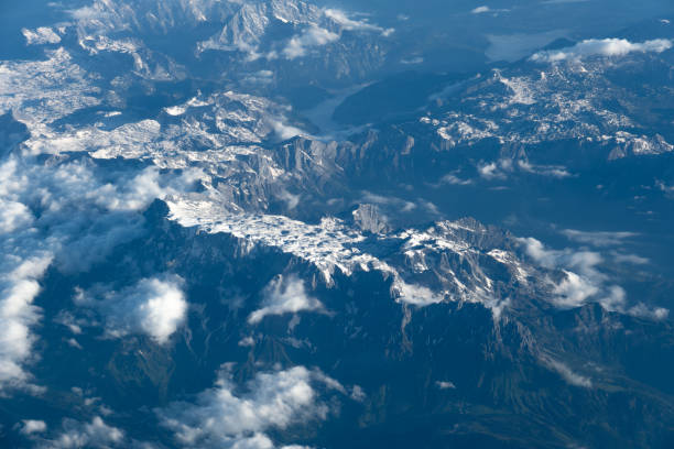 Aerial view of European Alps in spring. Snow still present on the Glaciers