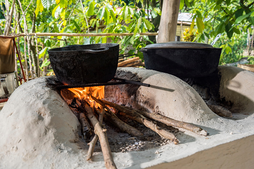 A traditional wood cooker in a rustic house