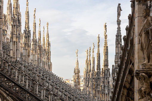 The famous Milan Cathedral (Duomo di Milano) on the Piazza del Duomo in Milan, Italy. Details on the roof