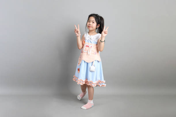 little asian girl - peace sign counting child human finger fotografías e imágenes de stock