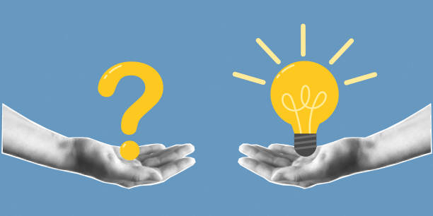 istock Two hands cut out of paper holding a question mark and a light bulb 2078671681