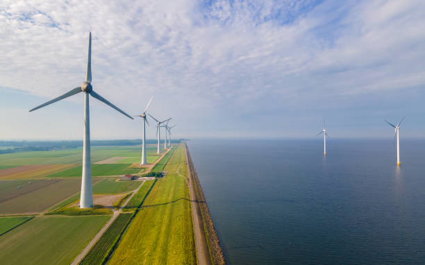 istock Wind turbine power generator at twilight 2078692609