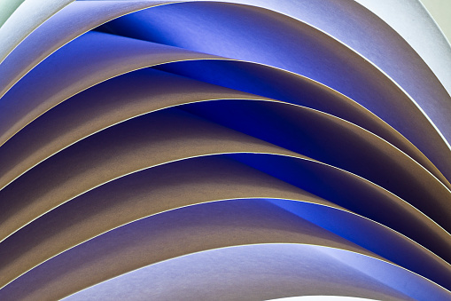 Sinuous abstract curves with illuminated paper