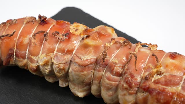 Baked pork, wrapped in a roll.