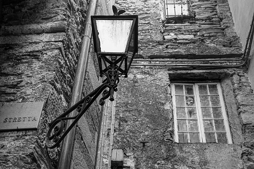 Triora, Imperia, Liguria, Italy - 01 03 2024: black and white photo. The local history of Triora testifies to the famous witchcraft trials carried out from 1587 to 1589, when local women accused of practicing witchcraft were imprisoned and tortured, some to death.