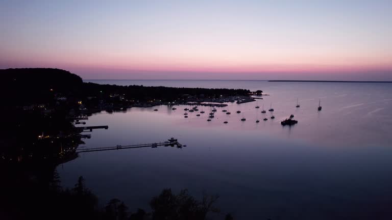 Nighttime drone shot view of a marina in door county, wisconsin