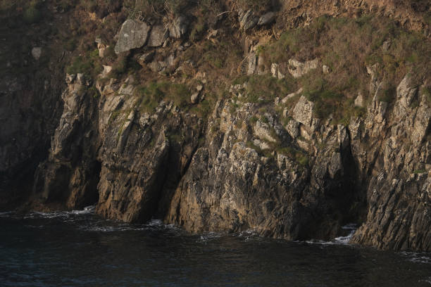 What an island tour can offer in terms of rocky landscape variety. Bretagne (West of France); Photos focusing on eroded rocky formations.