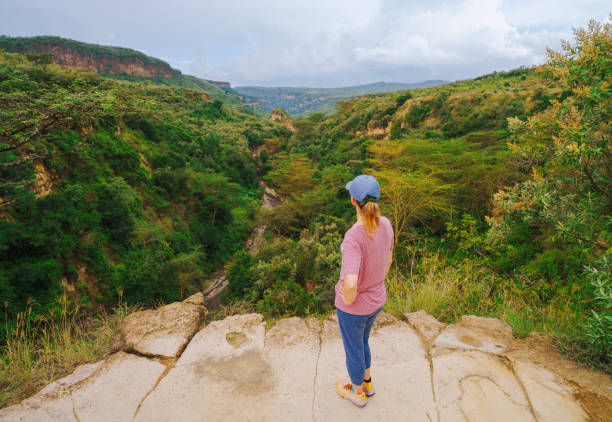 Woman hiker in Hell's gate national park looking at view