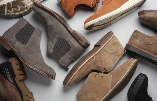 istock Different casual shoes on gray background. Top view. Creative fashion flat lay 2078762921