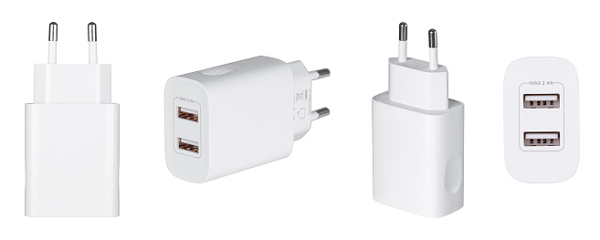 AC charger with USB and Type-C connector on isolated and white background, close-up