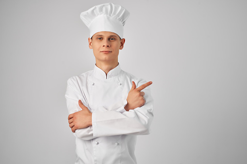 chef gesturing with his hands restaurant professional job. High quality photo