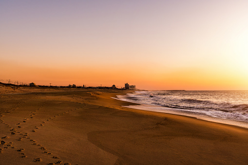 Beautiful tranquil beach in Portugal during sunset.
