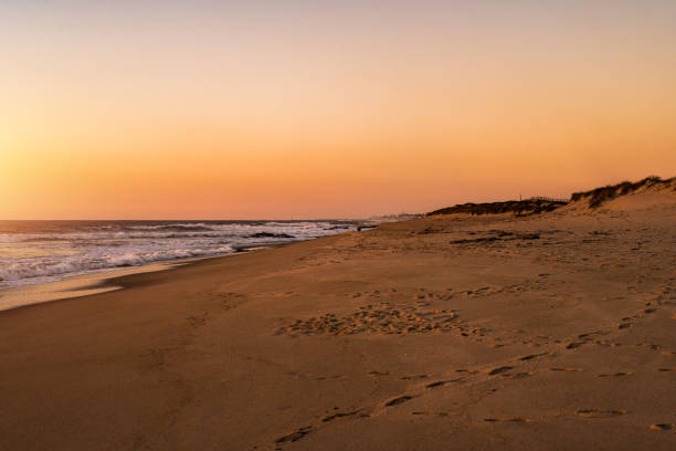 Beautiful tranquil beach in Portugal during sunset.