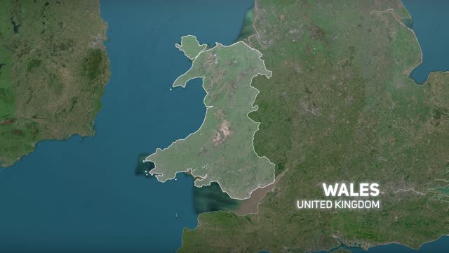 Zoom in to Wales, UK from Earth. Satellite view of the United Kingdom. Cinematic world map animation from outer space to territories. The concept of Highlight, globe, aerial view, tourism, travel, journey, cityscape