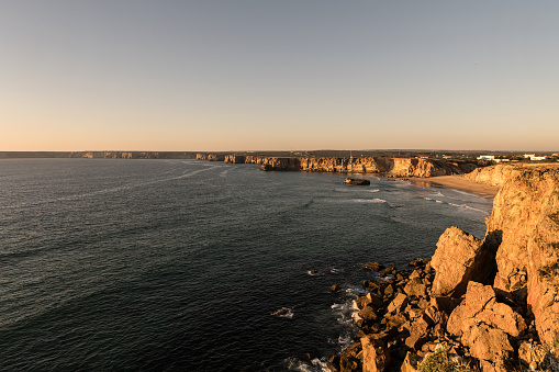 Beautiful Tonel beach with stunning cliffs surrounding it in Sagres, Algarve, Portugal. Surf spot in Sagres.