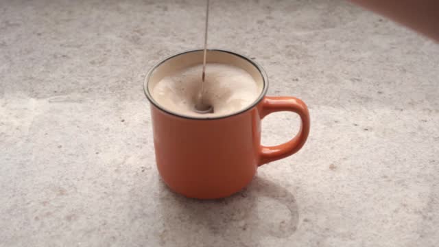 Slow Motion Hot Chocolate Frothing for Beverage Preparation
