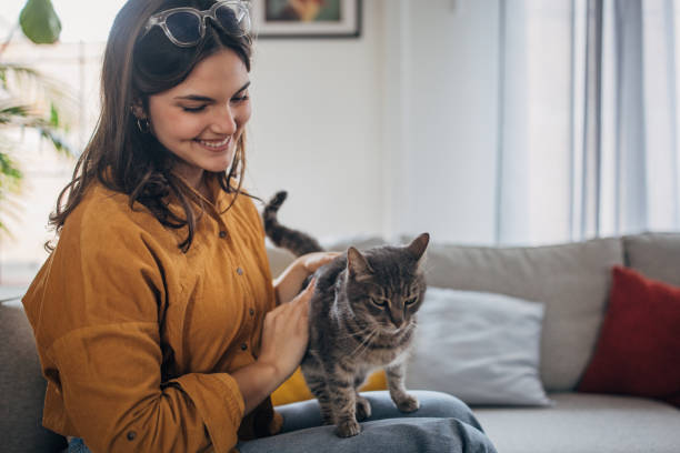 istock Young woman loves her cat 2078868170