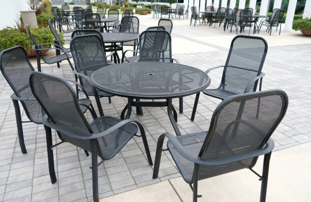istock chairs and table outdoor in the garden 2078876097