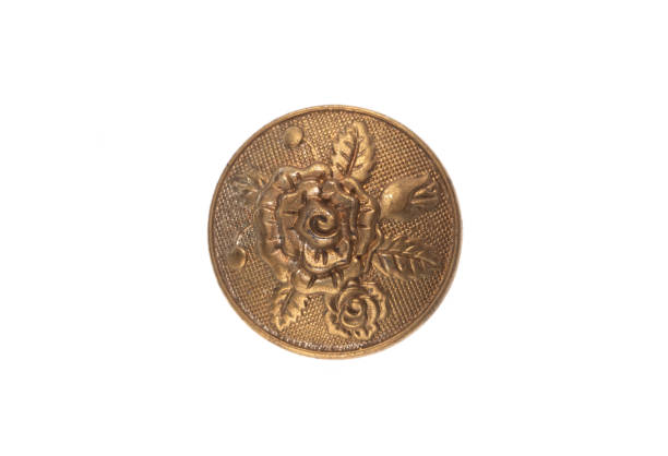 istock golden shield with floral pattern isolated on white background 2078881969