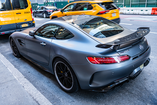 New York City, USA - August 09, 2023: Mercedes Benz AMG GT 2018 sportscar sport car, back corner view.