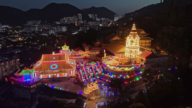 Aerial night view of Kek Lok Si Temple with holiday illumination in the island of Penang, Malaysia - one of the largest temples complexes in Southeast Asia