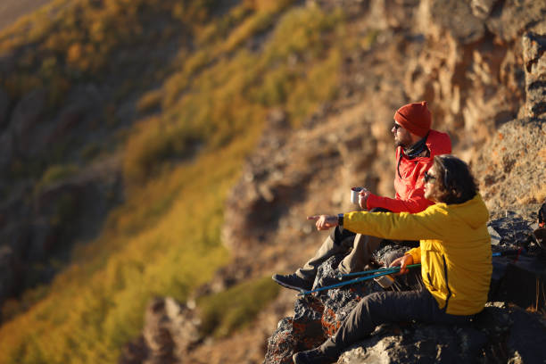 istock Hiking male ascending mountain meadow crest. 2078900826