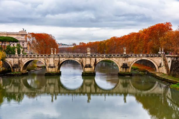 istock Sant'Angelo bridge over Tiber river during cloudy sky background in Rome, Italy. 2078929910