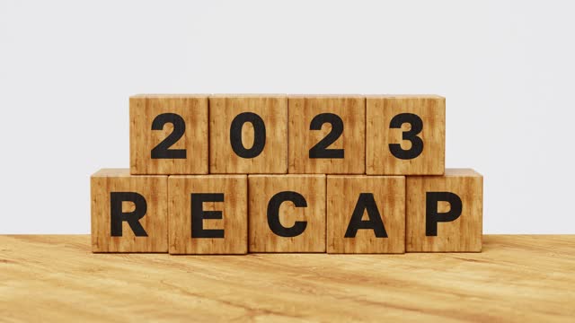 2023 Recap economy, business, financial summary, business review concept. Business plan for 2024. 2023 Recap on wooden cubes. 4k 3d animation