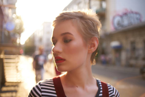 istock short haired woman wearing glasses walk sun vacation 2078943612