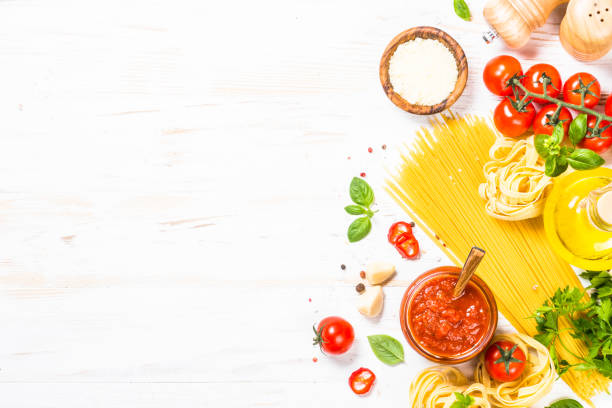 istock Italian food background at white bkitchen table. 2078945161