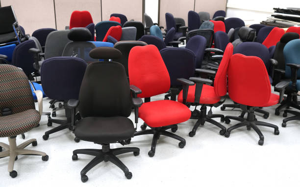 istock stored chairs in office storage room 2078950922