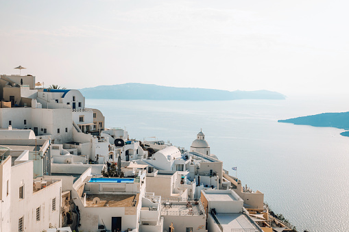 View from Oia towards the island of Thirasia, an island in the volcanic island group of Santorini in the Greek Cyclades, Greece