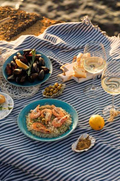 istock Shrimp, Seafoods, appetizers and salads on the table in Fish Restaurant. Beach Restaurant in Greece or Turkey. Aegean seaside, Greek or Turkish style fish restaurant in Bodrum, Santorini or Mykonos 2078972784