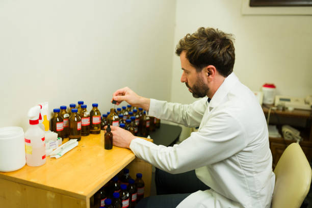 istock Homeopathic doctor preparing the formula medicine 2079025283