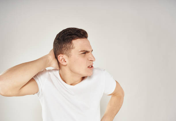 istock indignant man looks to the side on a light background cropped view Copy Space 2079032552