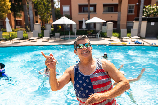 Seniors exercising in a water aerobics class