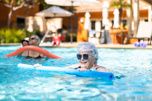 Senior ladies enjoying water aerobics class