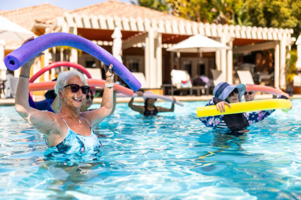 istock Senior ladies enjoying water aerobics class 2079057698