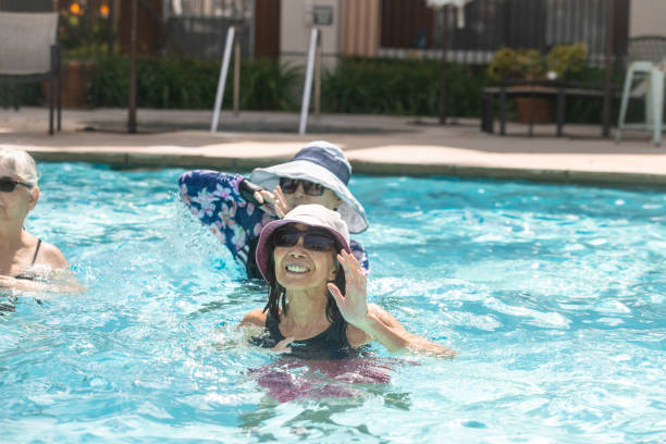 istock Senior ladies enjoying water aerobics class 2079060622
