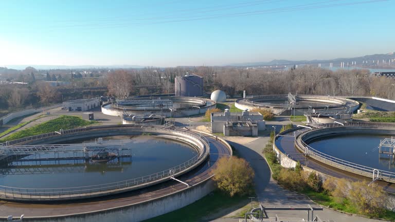 Aerial establishing shot of a large water purification plan in Avignon