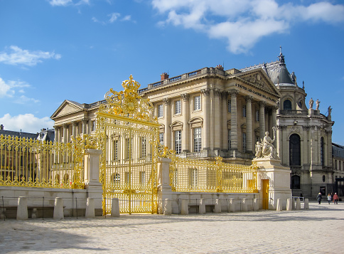 Versailles, France - April 2016: Royal chapel of Versailles palace behind Golden gate, Paris suburbs