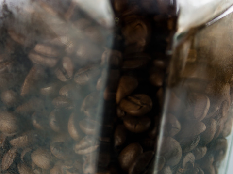 Coffee beans in glass packaging, large