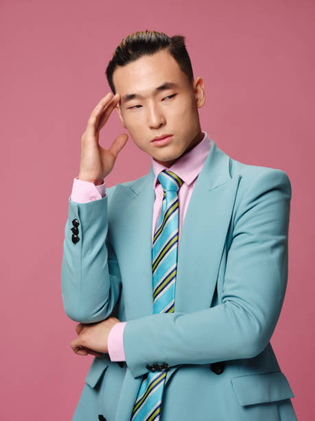 istock Business man official confident cropped view blue jacket pink background 2079125692
