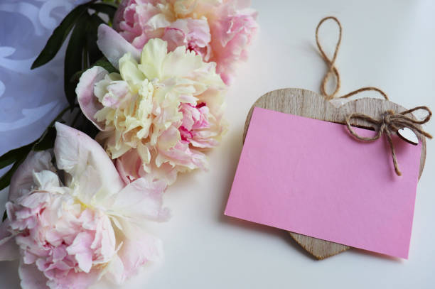 istock bouquet of peonies and white blank for text 2079134768