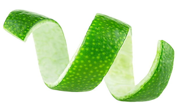 istock Peel of green lime isolated on a white background. Lime twist. Lime fruit zest. 2079155233